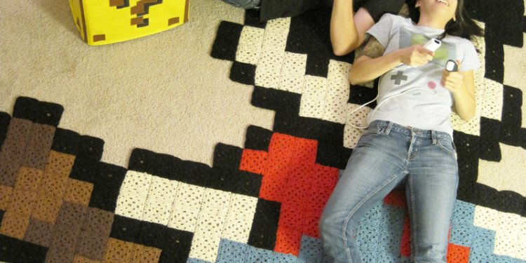 Aerial view: Raccoon Mario rug Question Block ottoman for Nintendo Power!