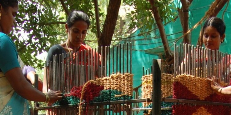 Bhanumati making mats with