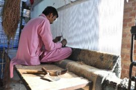 a carpet weaver uses around annually working on a hand-knotted rug