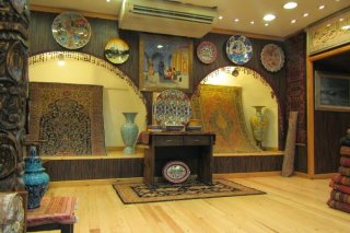 an array of rugs at a store in Istanbul, Turkey