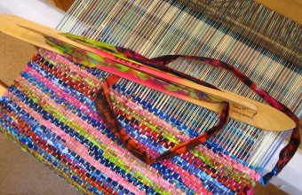 colorful rag runner woven with quilt material scraps